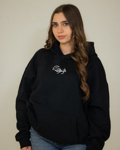 Sawt Al-Zaman Model wearing a black El Sett Umm Kulthum hoodie.