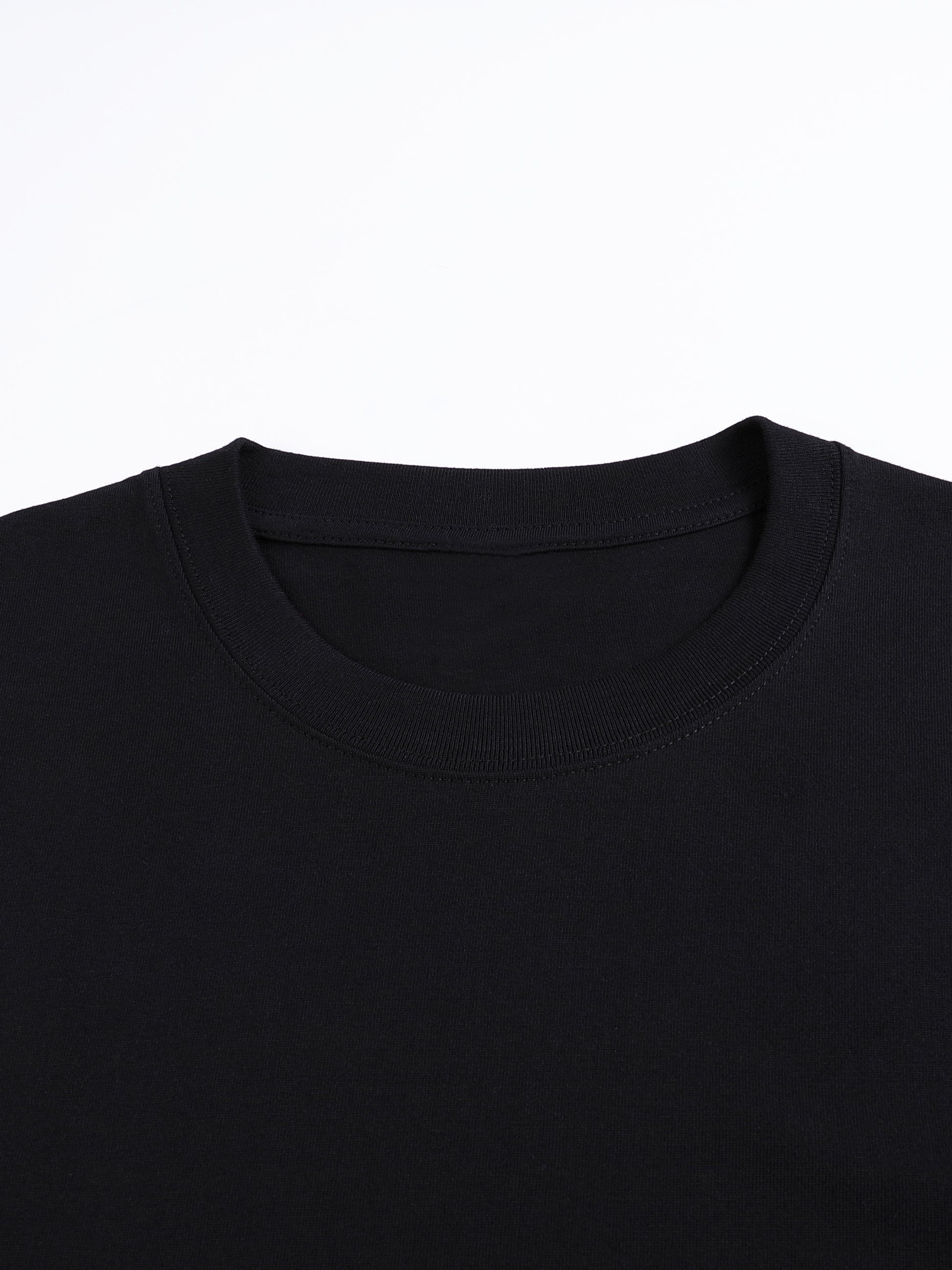 Oversized heavyweight cotton T-shirt fit reference with drop shoulders for unisex Arabic heritage streetwear.