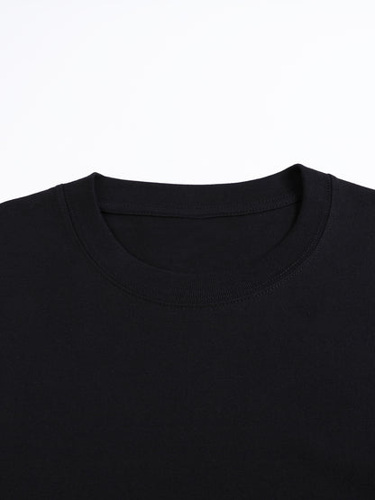 Oversized heavyweight cotton T-shirt fit reference with drop shoulders for unisex Arabic heritage streetwear.