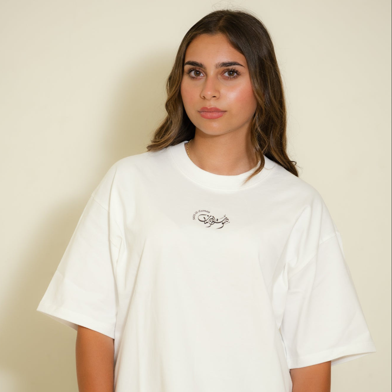 Umm Kulthum Cairo Nights T-shirt photoshoot featuring Arabic heritage artwork honoring the Star of the East.