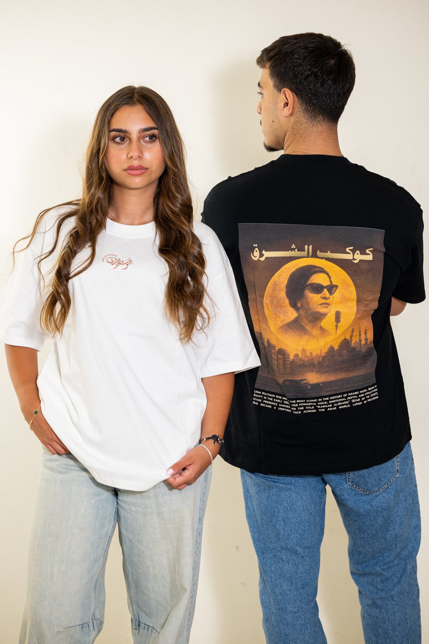 Model styling the Umm Kulthum Cairo Nights graphic T-shirt, a modern streetwear tribute to the Egyptian music icon.